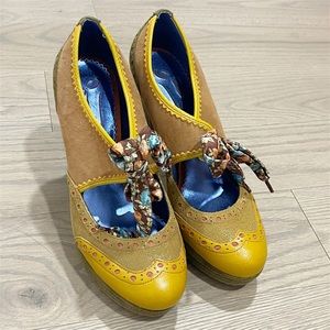 Cute gold Poetic Licence platform heels